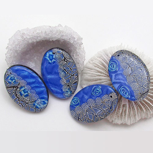 Bright blue metallic clay and translucent lace canes