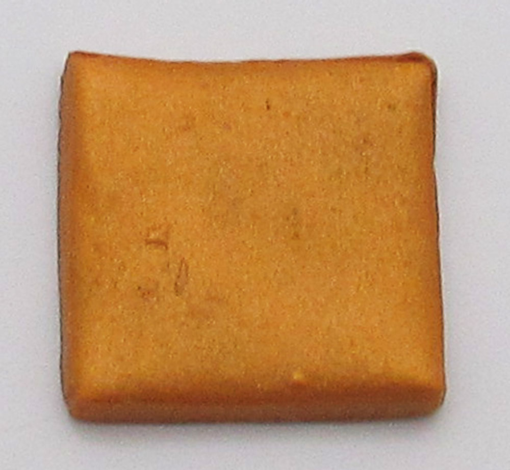 Polymer clay marked by baking soda particles
