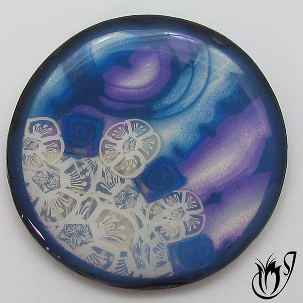 Polymer clay mokume gane and translucent cane bead