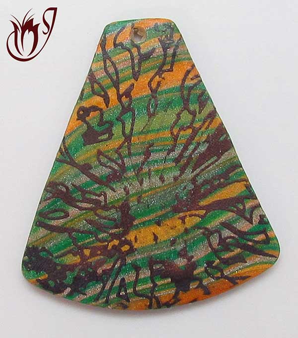 polymer clay bead with scratched surface effect