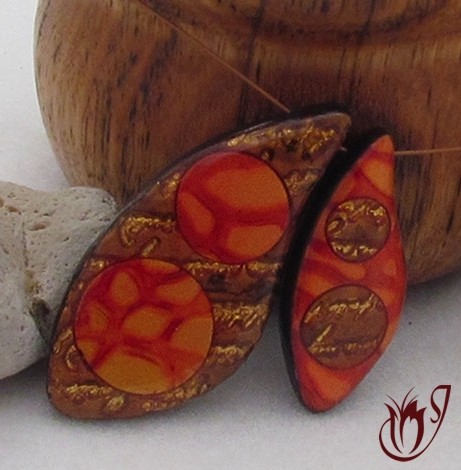 Mixed media and mica shift polymer clay beads.