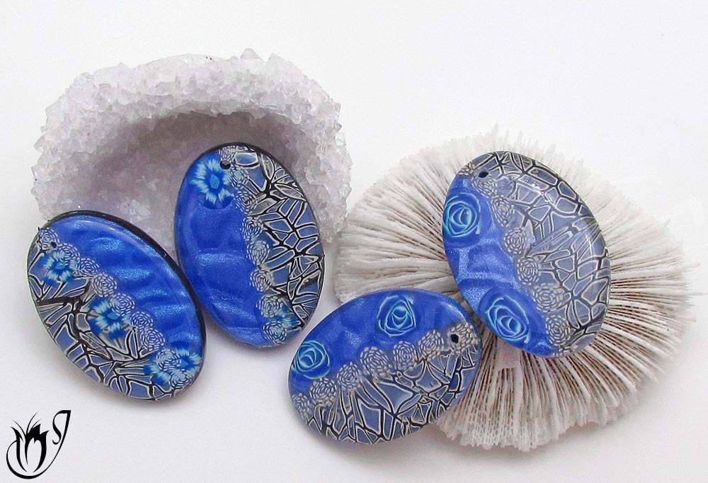 Blue mica shift polymer clay pendants with rose and lace canes