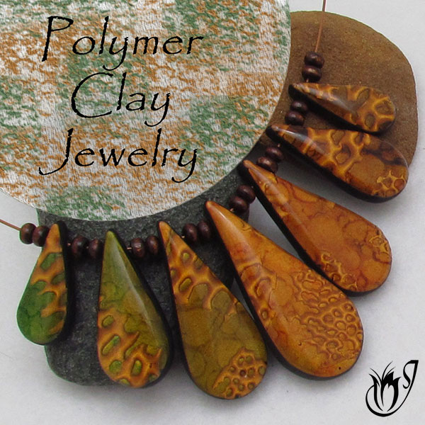 Polymer clay mica frills and alcohol inks necklace